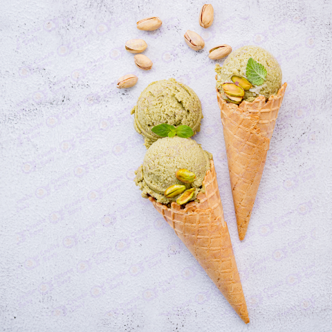 Pistachio ice cream in cones with pistachio nuts free png image